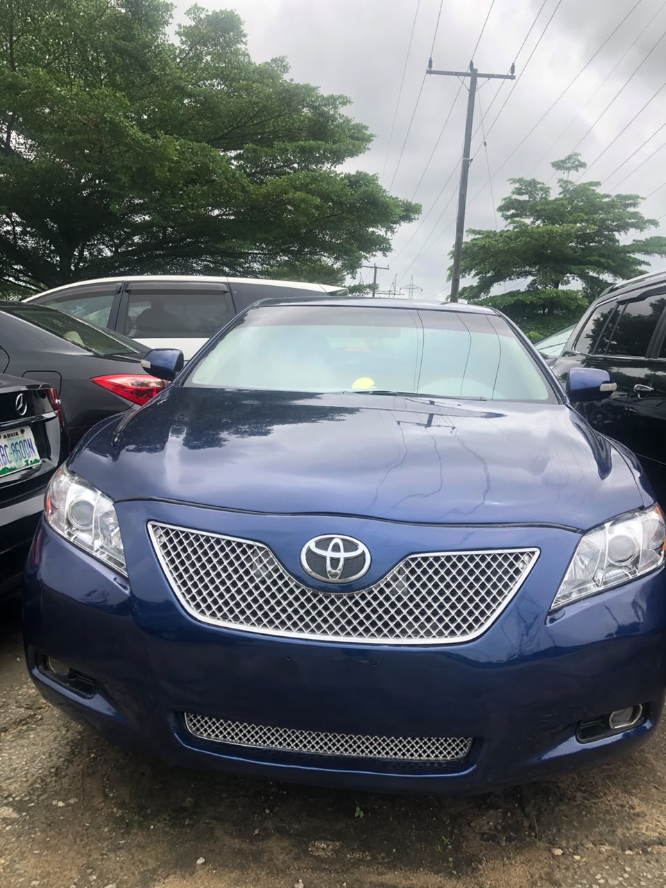 Toyota Camry Muscle 2008/2010 — Blue on Black, 4-cylinder.